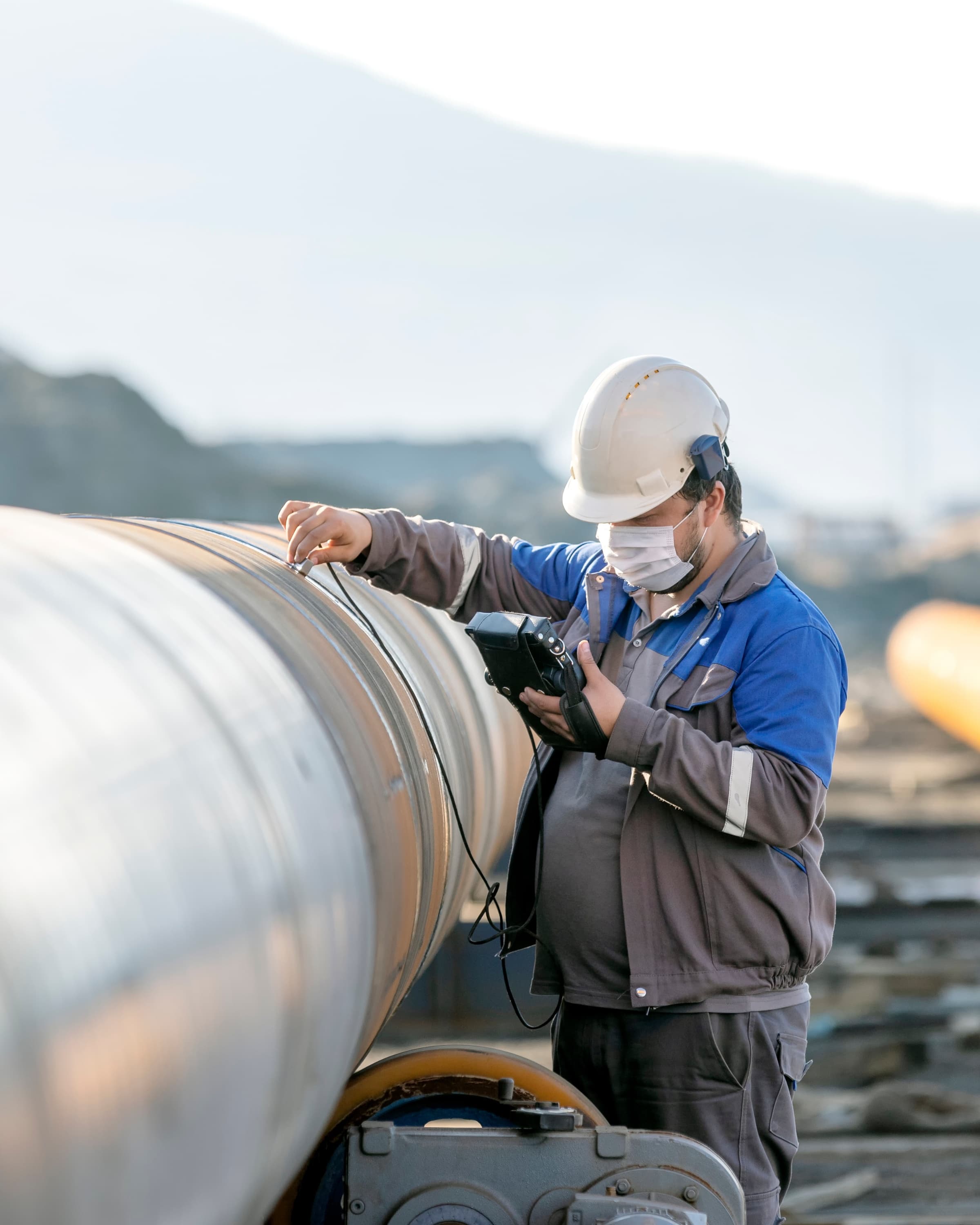 Close-up of NDT inspection on welded piping