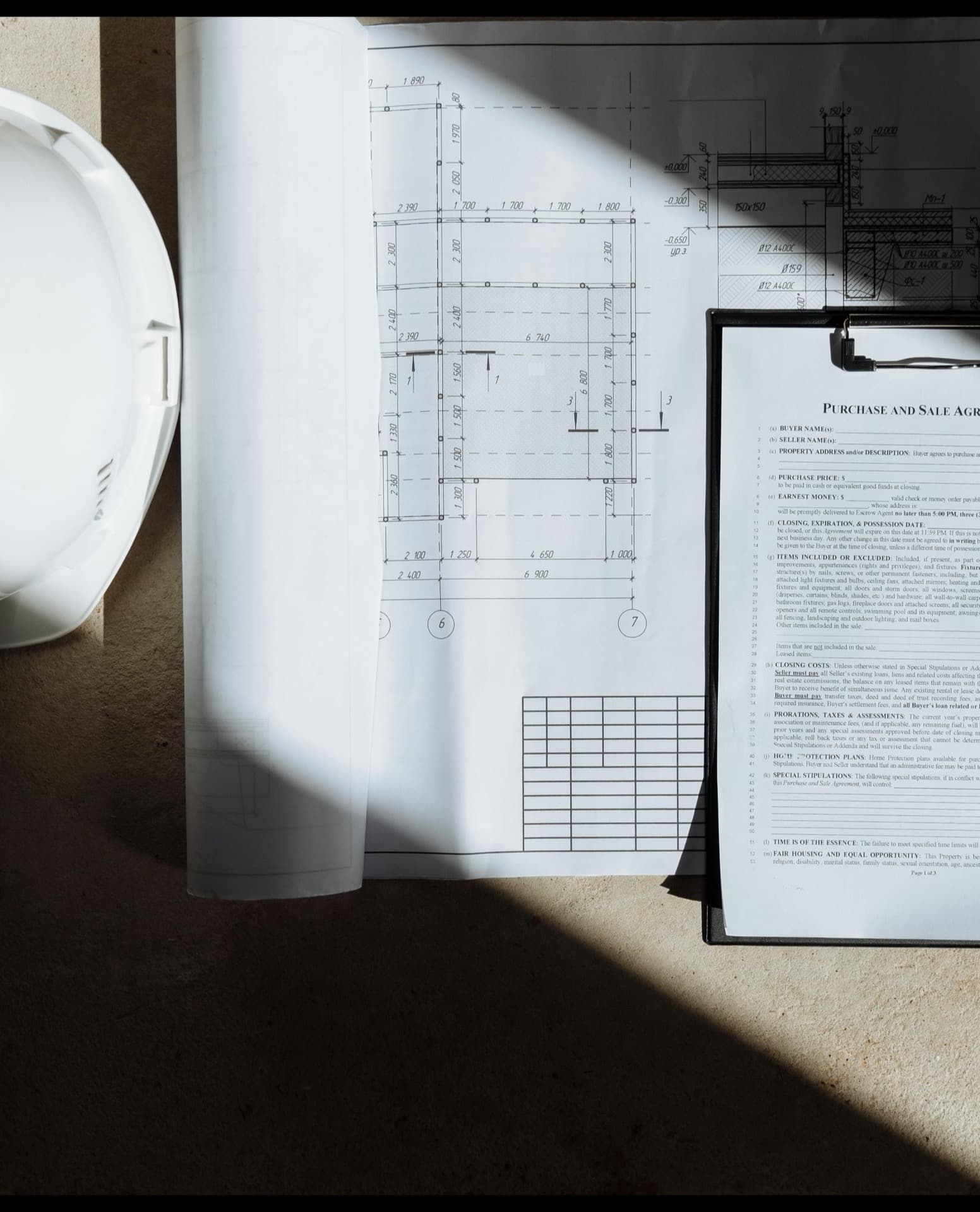 Engineer reviewing approval documentation at a refinery site office